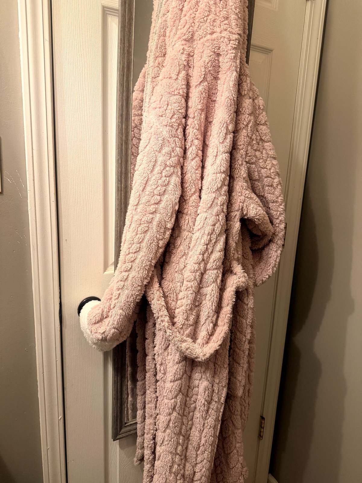 This funny photo of a pink robe will brighten your day and warm your heart