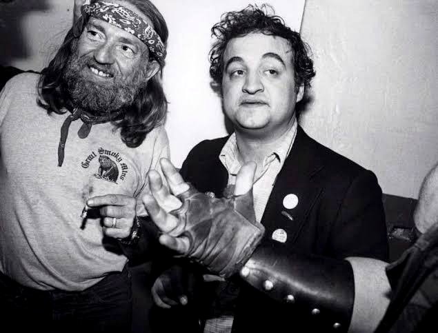 Willie Nelson celebrates his 93rd birthday today; here’s a picture of him with John Belushi enjoying a blunt (circa 1970s).