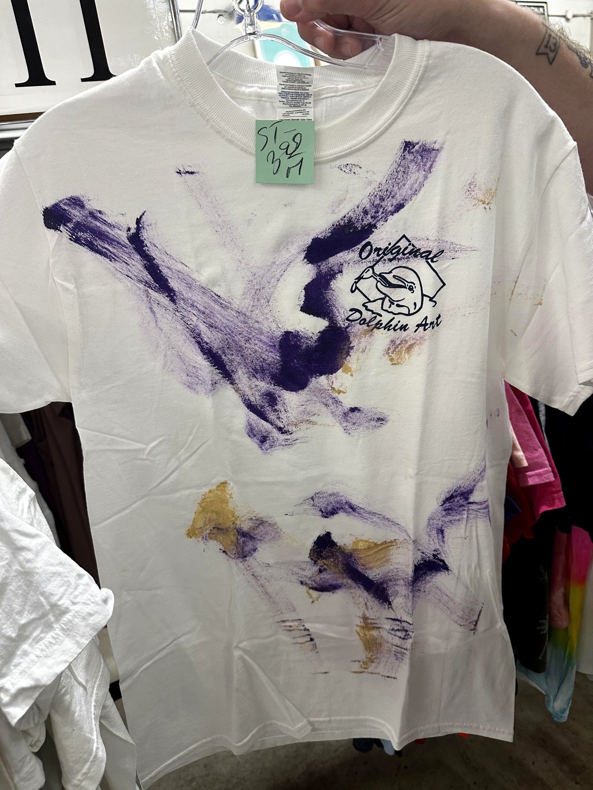 you'll be amazed the story behind this thrift store find painted by a dolphin