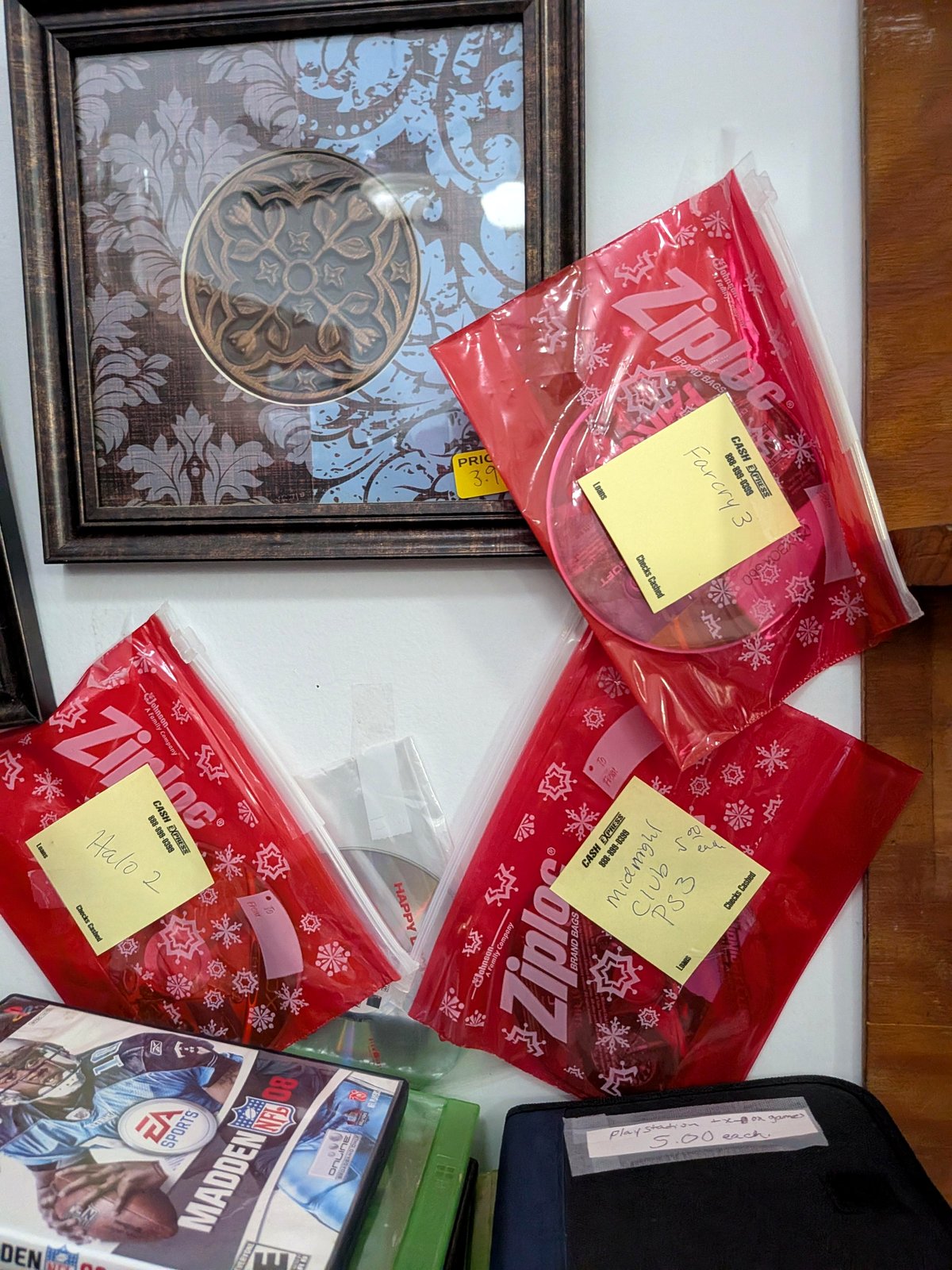 Discover the quirky charm of PS3 games wrapped in Christmas cheer at this thrift shop