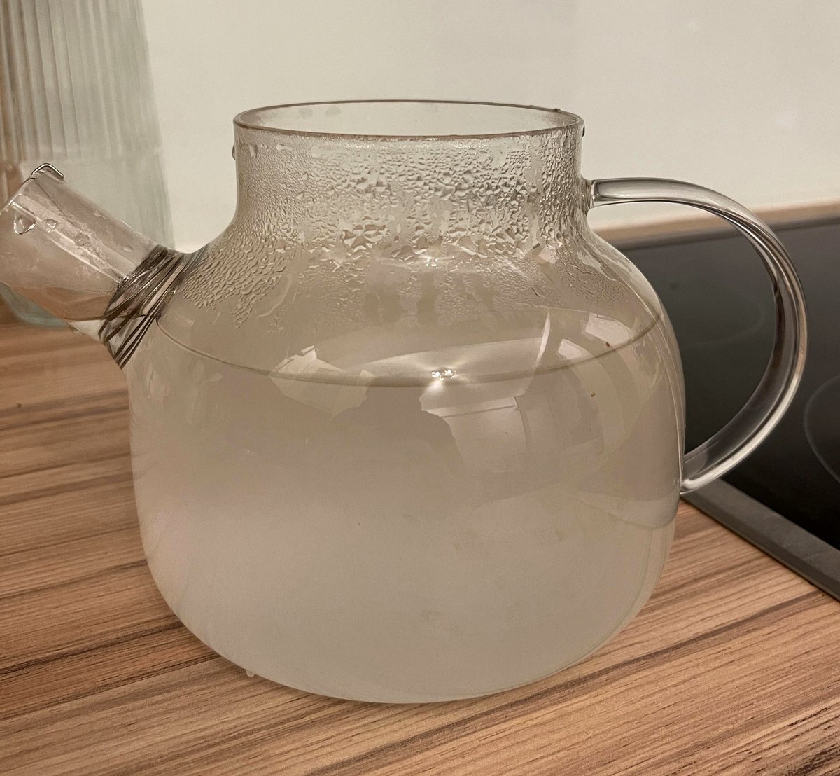 Why did this mom's boiled bottled water turn cloudy and milky?