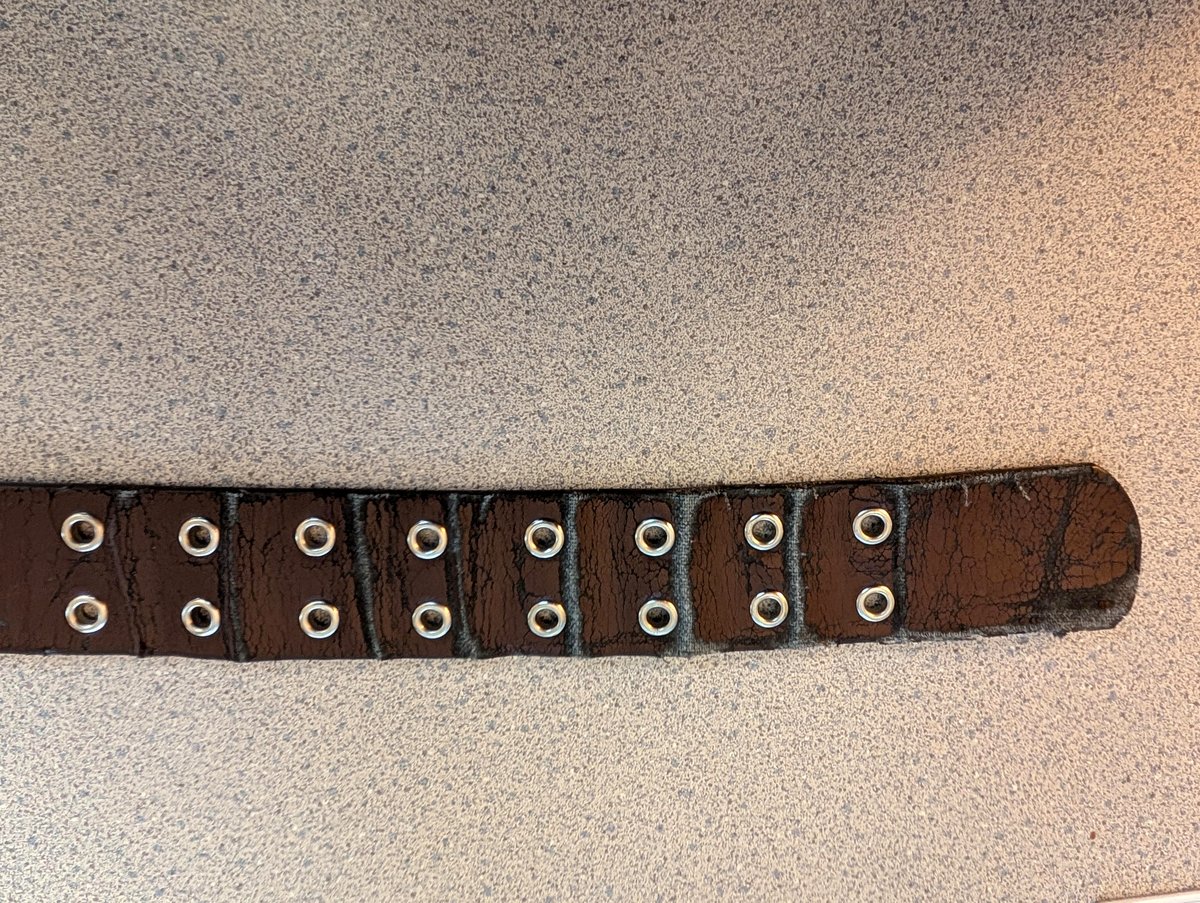 This belt tells a powerful story of transformation and determination