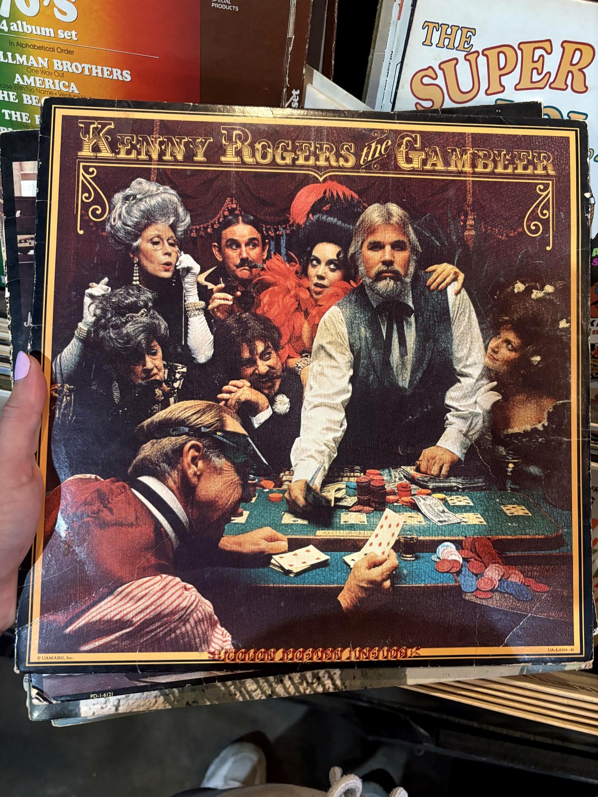 Why this vintage Kenny Rogers album cover has everyone talking about Aubrey Plaza