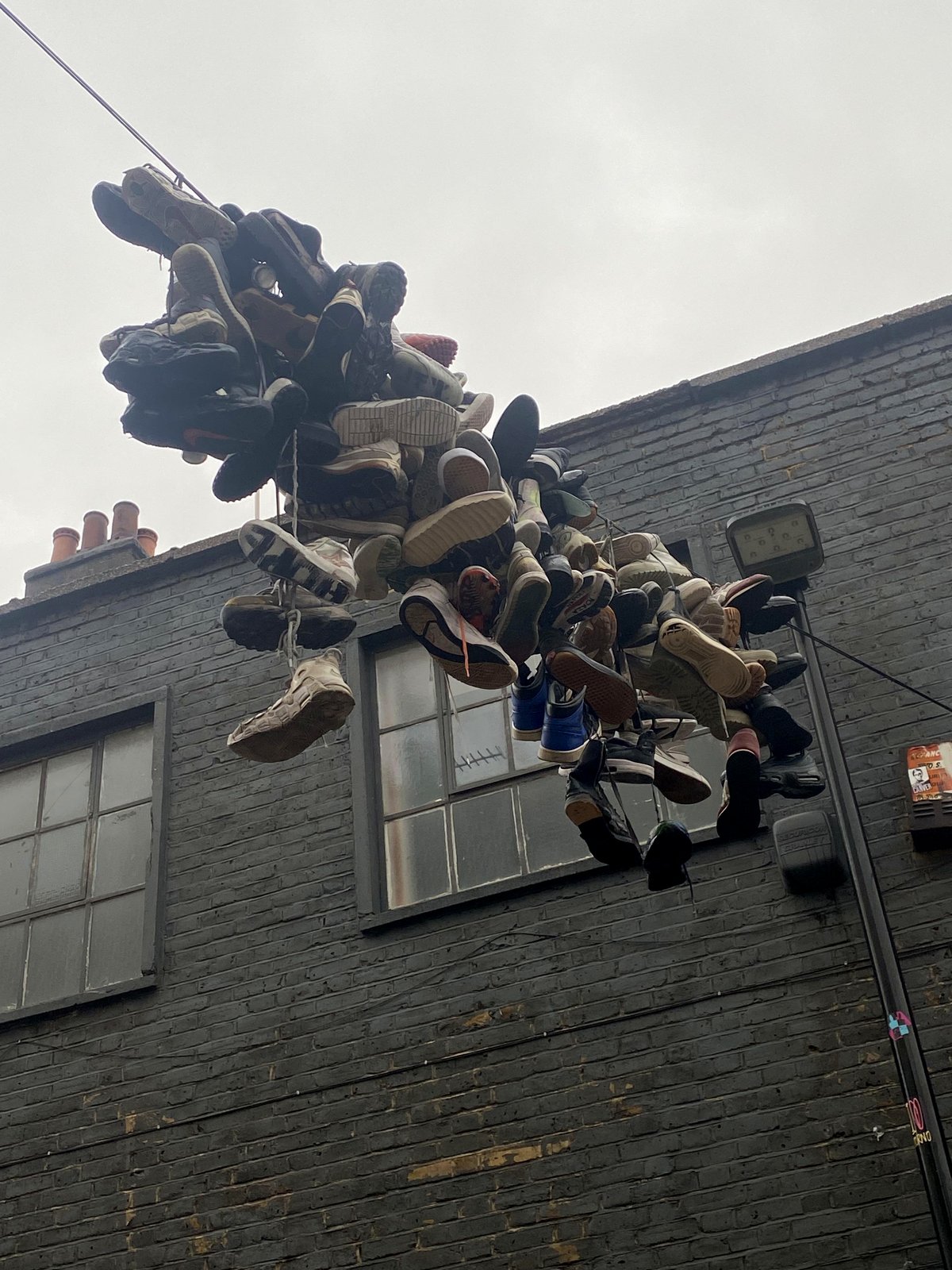 Shoes on a wire: what could this unusual sight mean?