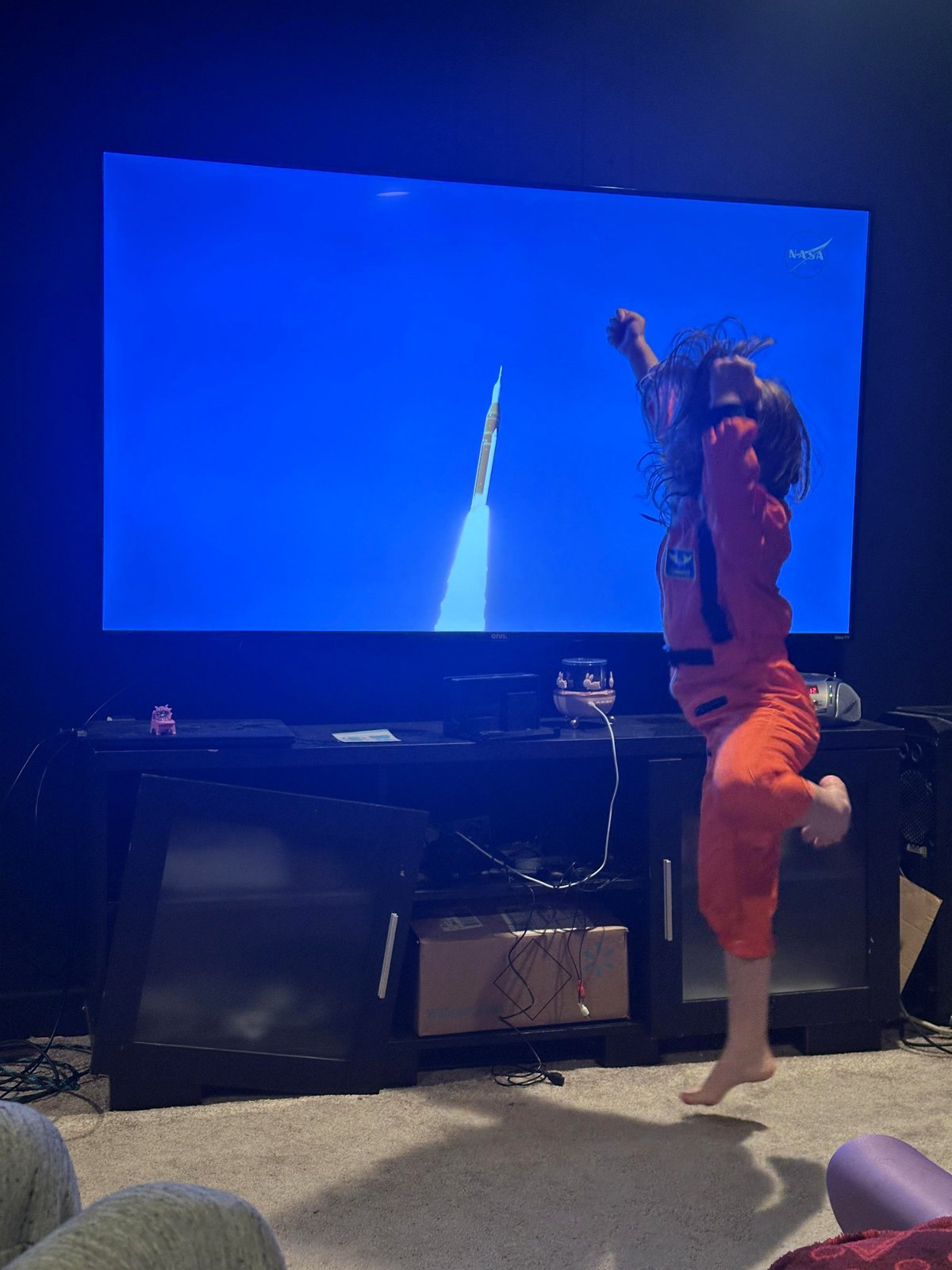 The Magical Moment When a Child Celebrates a Historic Rocket Launch