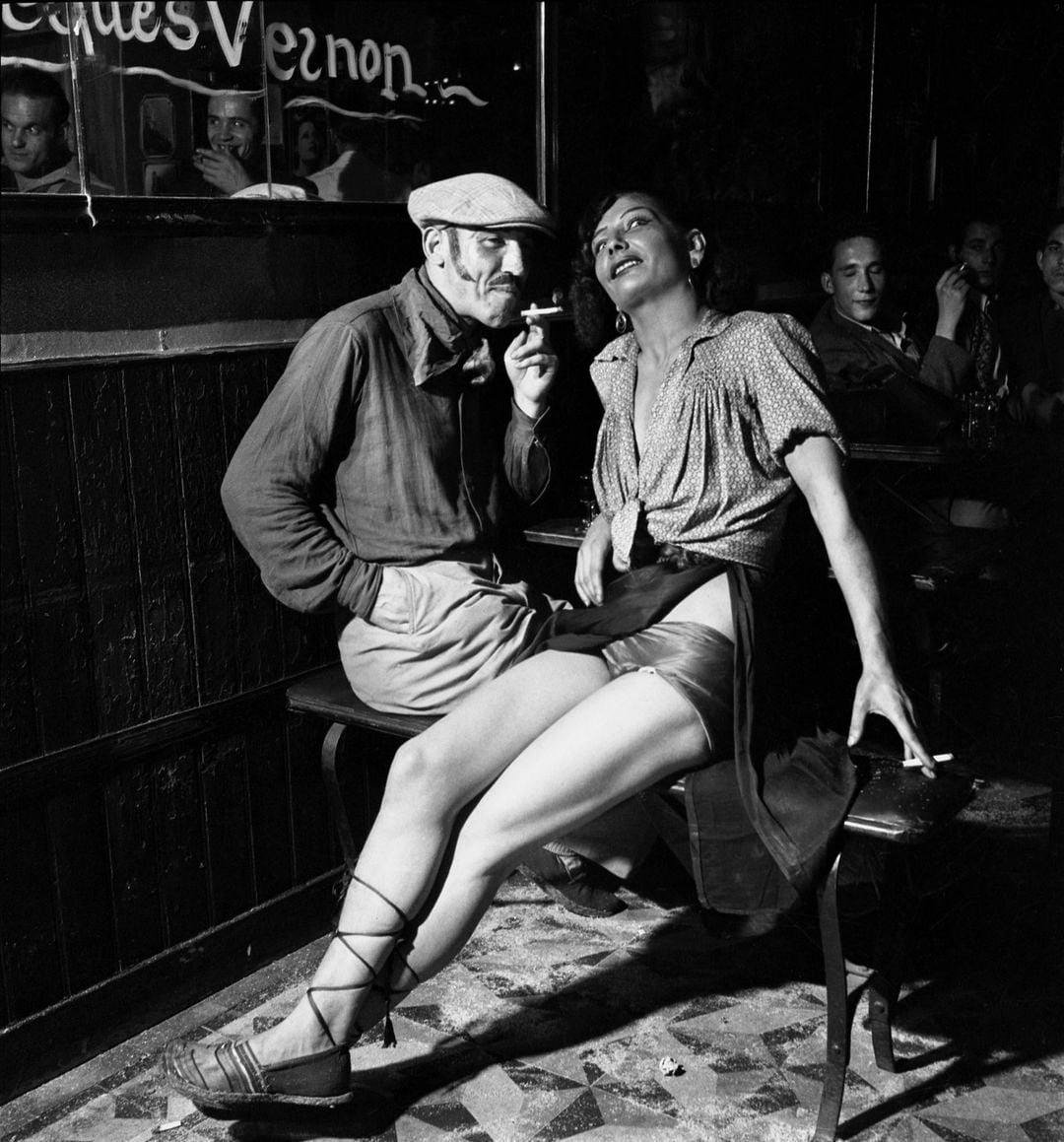 A depiction of a bar in Pigalle, Paris, 1937. By Emile Savitry