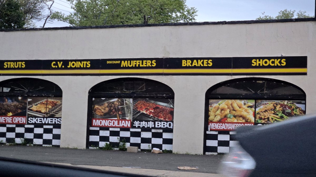 A Mongolian BBQ restaurant that also provides auto repair services. Or an auto repair shop that serves Mongolian BBQ.