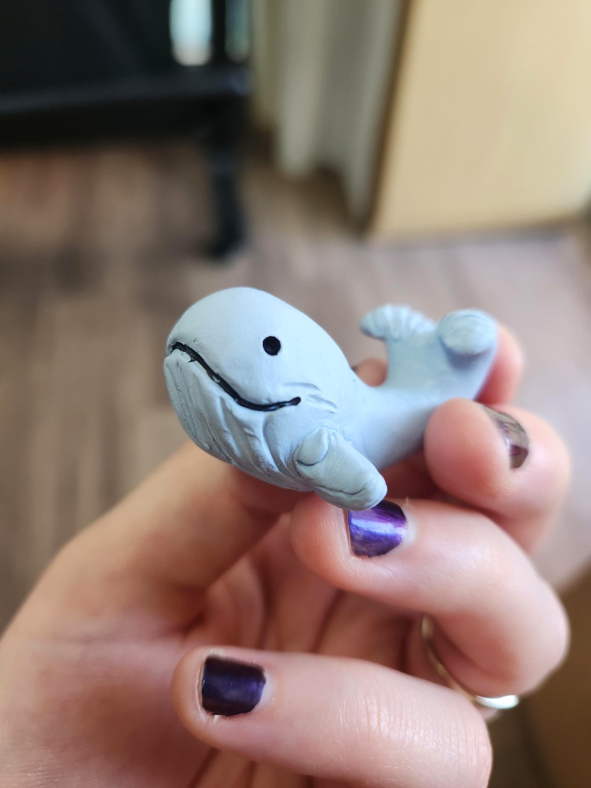 I created a small whale using sticky tack.