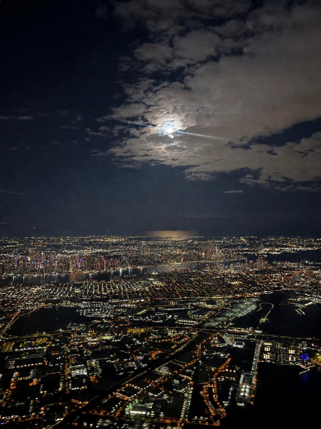 In the space between the moon and New York City. [OC]