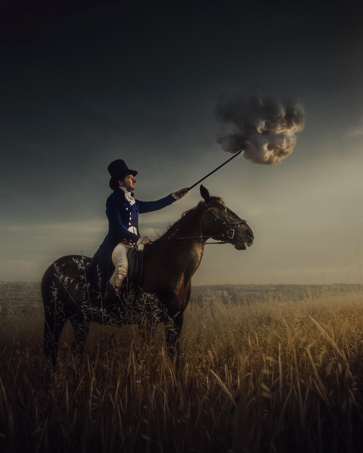 A picture I captured of a gentleman prodding a cloud. Not AI. [OC]