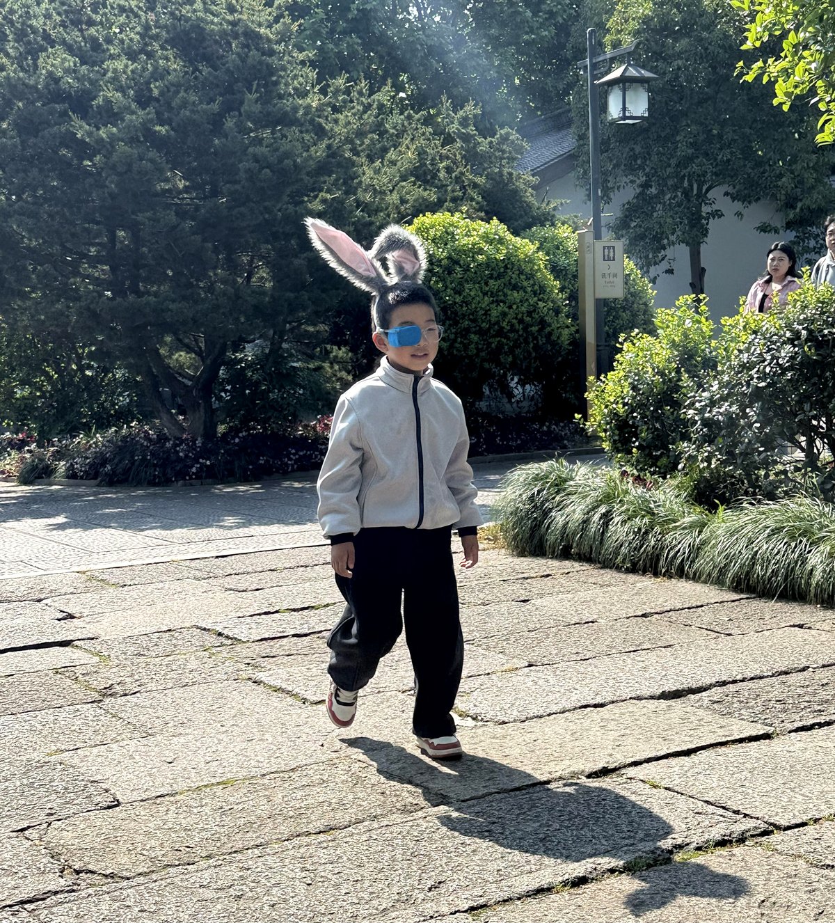 My nephew looks cute wearing his rabbit ears.