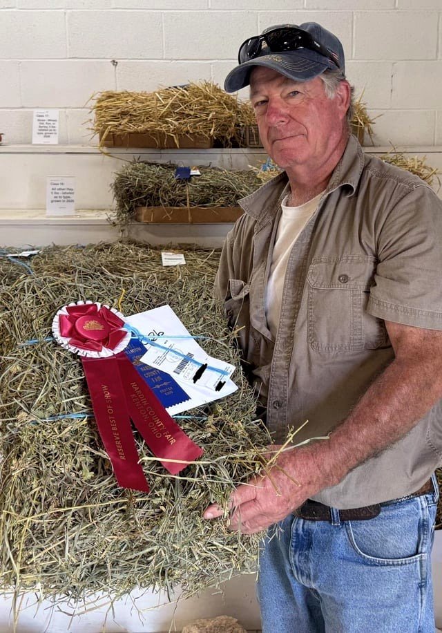 My father took first place and reserve best of show for his hay at the county fair.
