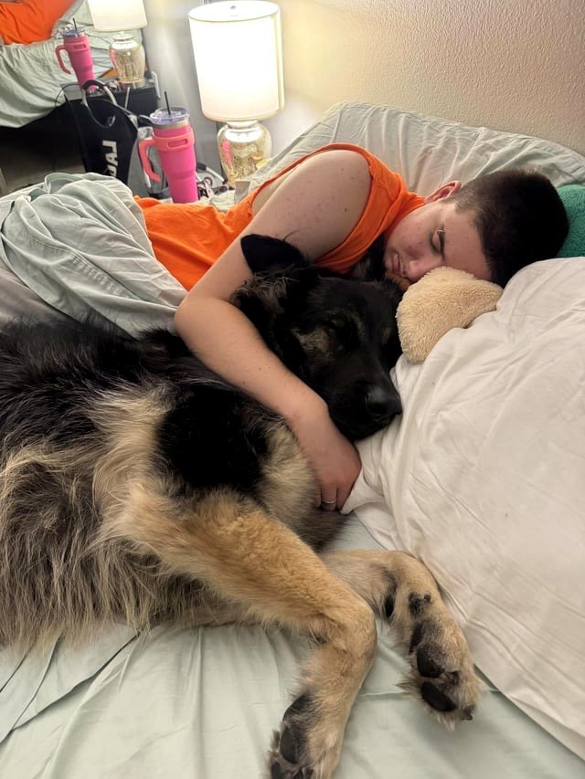 [OC] my mom took this picture of me dozing beside my dog